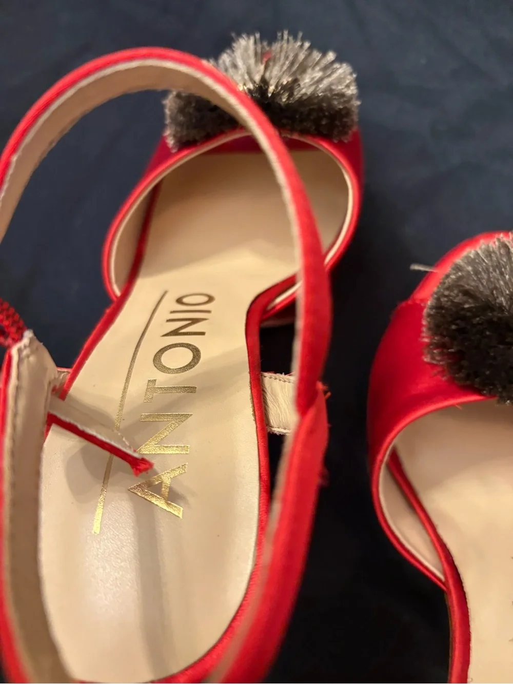 ANTONIO MELANI bold red